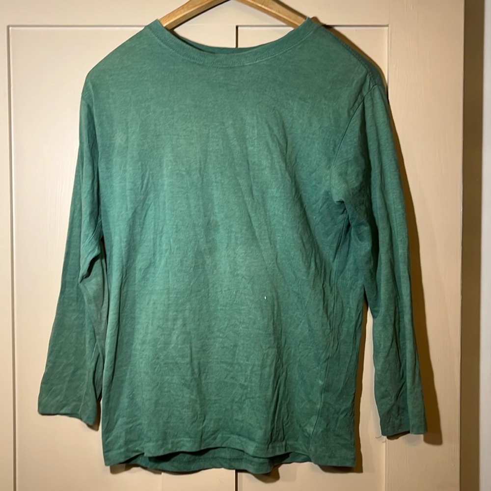 Green woman’s top